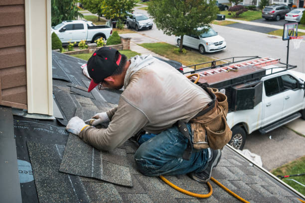 Professional Roofing technician working in Middleboro, MA